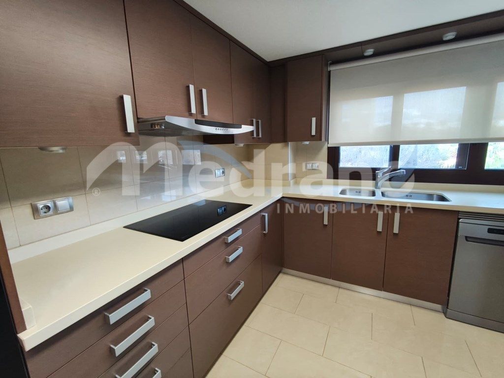 Kitchen of Apartment for sale in Benidorm  with Air Conditioner, Private garden and Swimming Pool