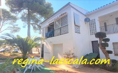 Exterior view of Single-family semi-detached for sale in L'Escala  with Air Conditioner and Terrace