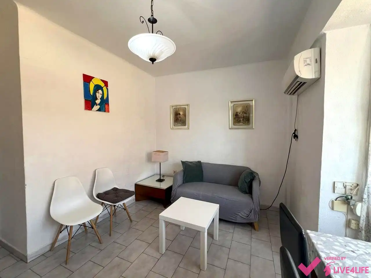 Sala de estar de Piso para compartir en Sevilla con Aire acondicionado, Calefacción y Amueblado
