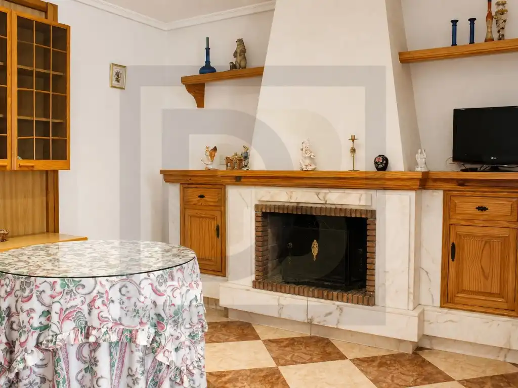 Sala d'estar de Casa o xalet en venda en San Miguel de Salinas amb Aire condicionat, Terrassa i Moblat