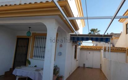 Exterior view of Single-family semi-detached for sale in Pilar de la Horadada  with Private garden, Storage room and Furnished