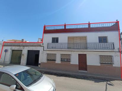 Vista exterior de Casa adosada en venda en Aznalcázar amb Piscina