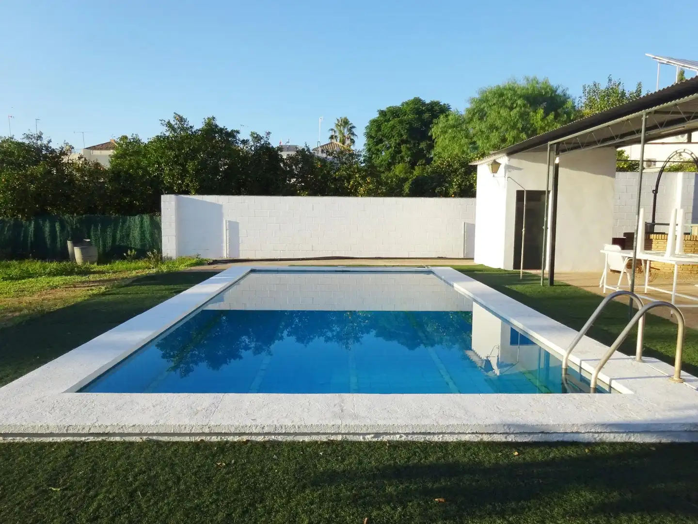 Swimming pool of Houses for sale in Sanlúcar la Mayor  with Air Conditioner, Private garden and Storage room