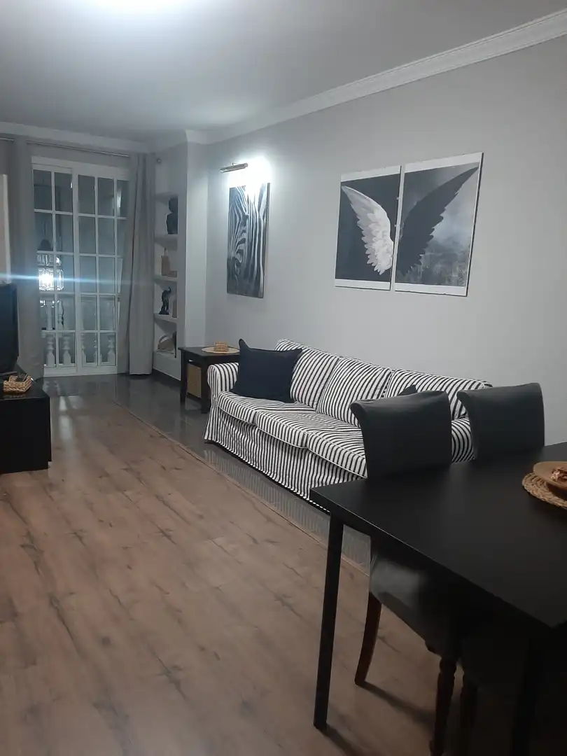 Living room of Flat for rent in Villaverde del Río  with Air Conditioner, Parquet flooring and Furnished