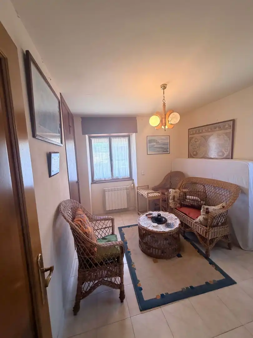 Sala de estar de Casa o chalet en venta en Navia con Calefacción, Terraza y Trastero
