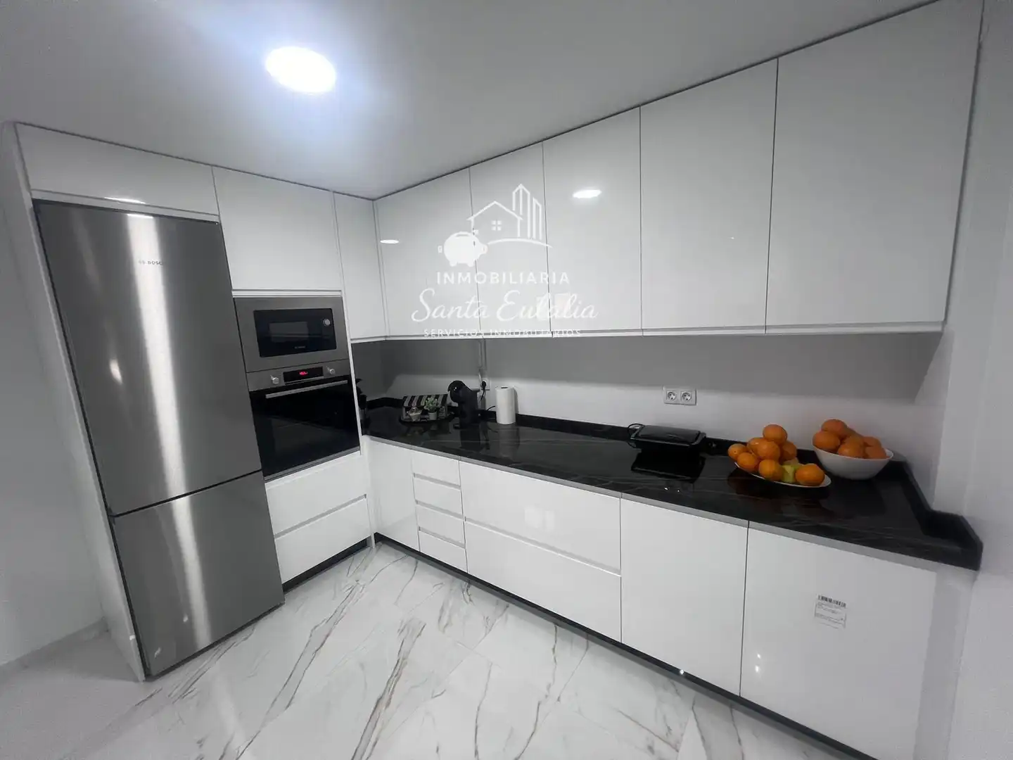 Küche von Wohnung zum Verkauf in Mérida mit Klimaanlage, Ofen und Waschmaschine