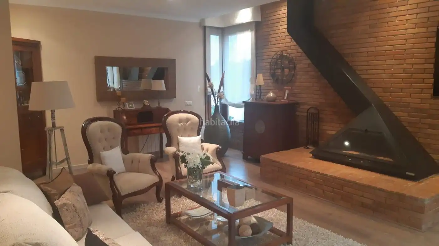 Sala d'estar de Casa o xalet en venda en Viladecavalls amb Aire condicionat, Traster i Piscina