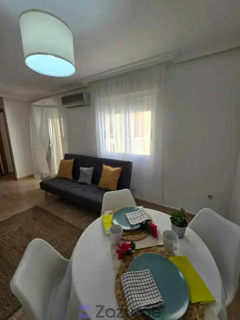 Sala d'estar de Pis de lloguer en Torrevieja amb Aire condicionat, Moblat i Forn