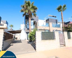 Exterior view of Single-family semi-detached for sale in Orihuela  with Air Conditioner, Heating and Private garden