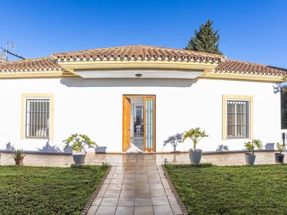 Exterior view of House or chalet for sale in Palomares del Río  with Air Conditioner, Heating and Private garden
