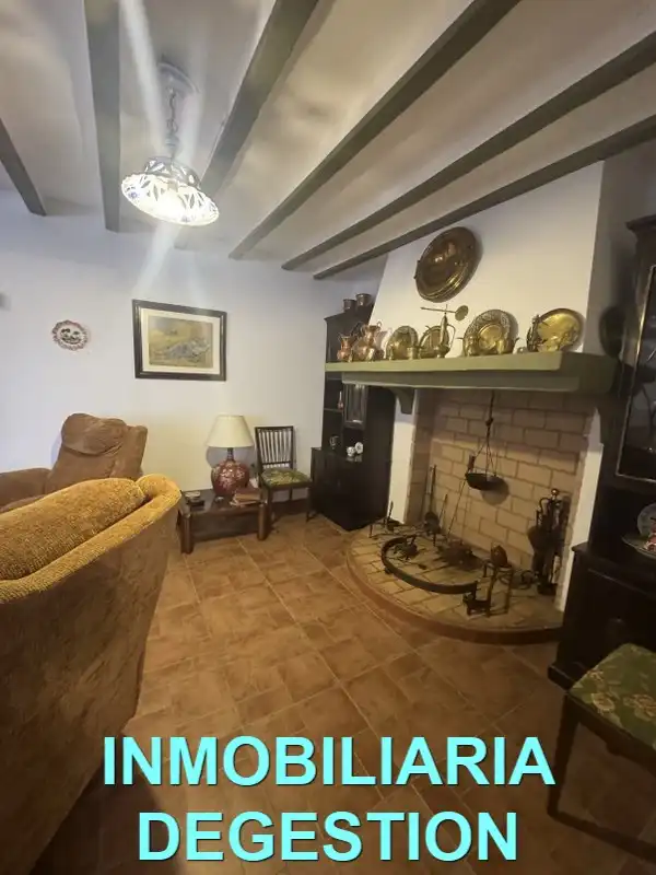 Sala de estar de Casa adosada en venta en Guarromán con Aire acondicionado, Calefacción y Jardín privado