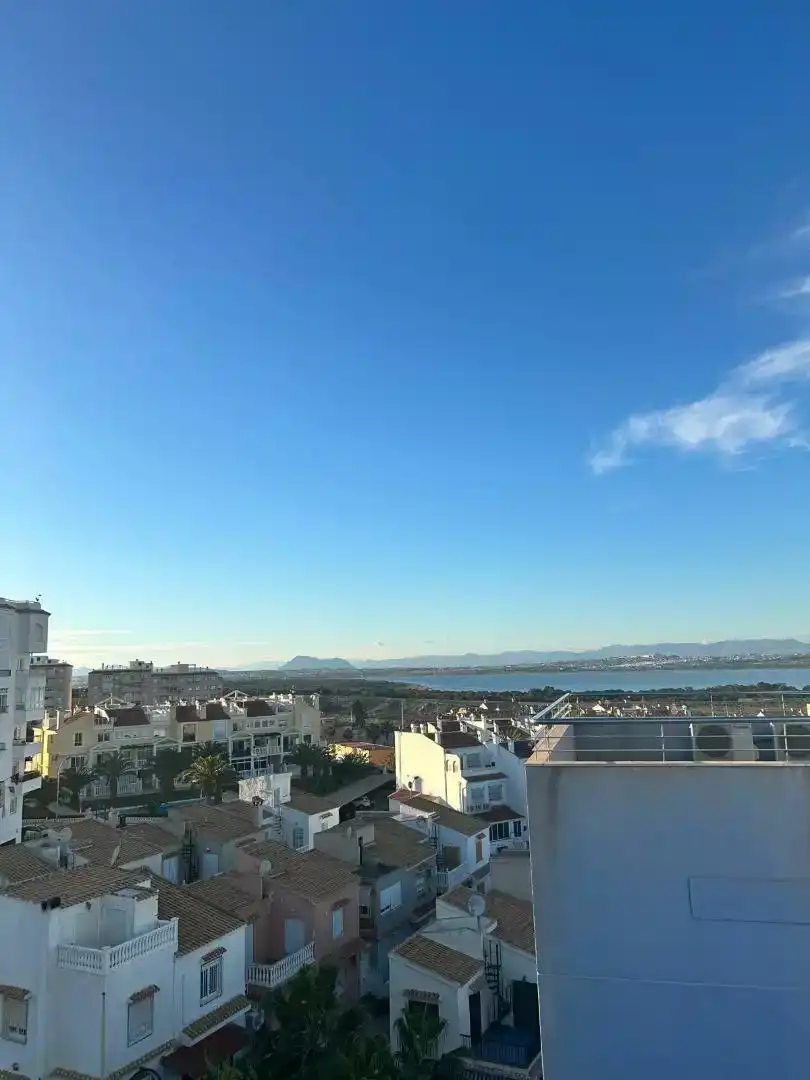 Exterior view of Attic for sale in Torrevieja  with Air Conditioner, Swimming Pool and Balcony