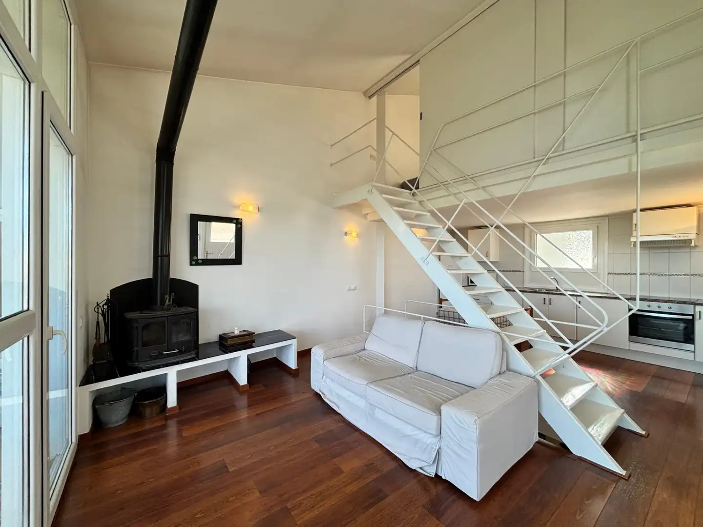 Sala de estar de Casa adosada en venta en Begur con Aire acondicionado, Calefacción y Jardín privado