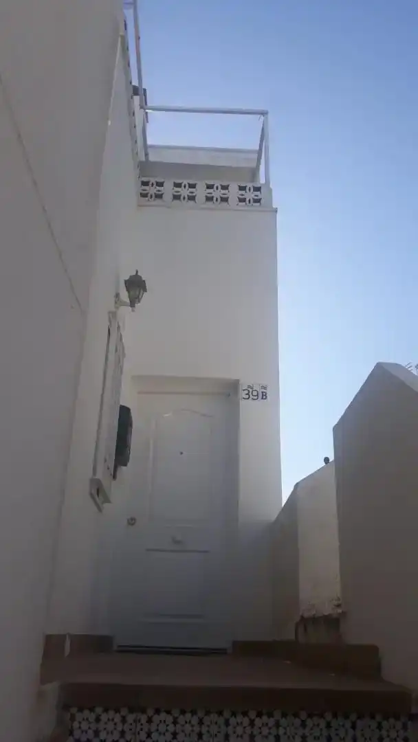 Außenansicht von Maisonette zur Miete in El Rompido mit Schwimmbad und Balkon