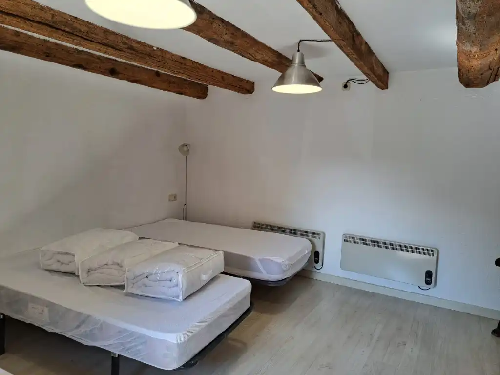 Schlafzimmer von Erdgeschoss zur Miete in Das mit Heizung, Privatgarten und Parkett