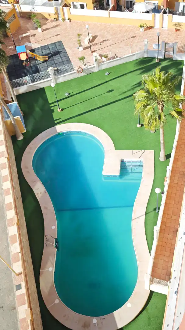 Swimming pool of Attic for sale in Roquetas de Mar  with Air Conditioner, Terrace and Furnished
