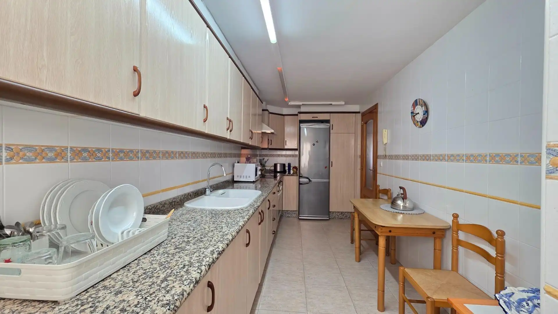 Küche von Dachboden zum Verkauf in Gandia mit Klimaanlage, Terrasse und Abstellraum