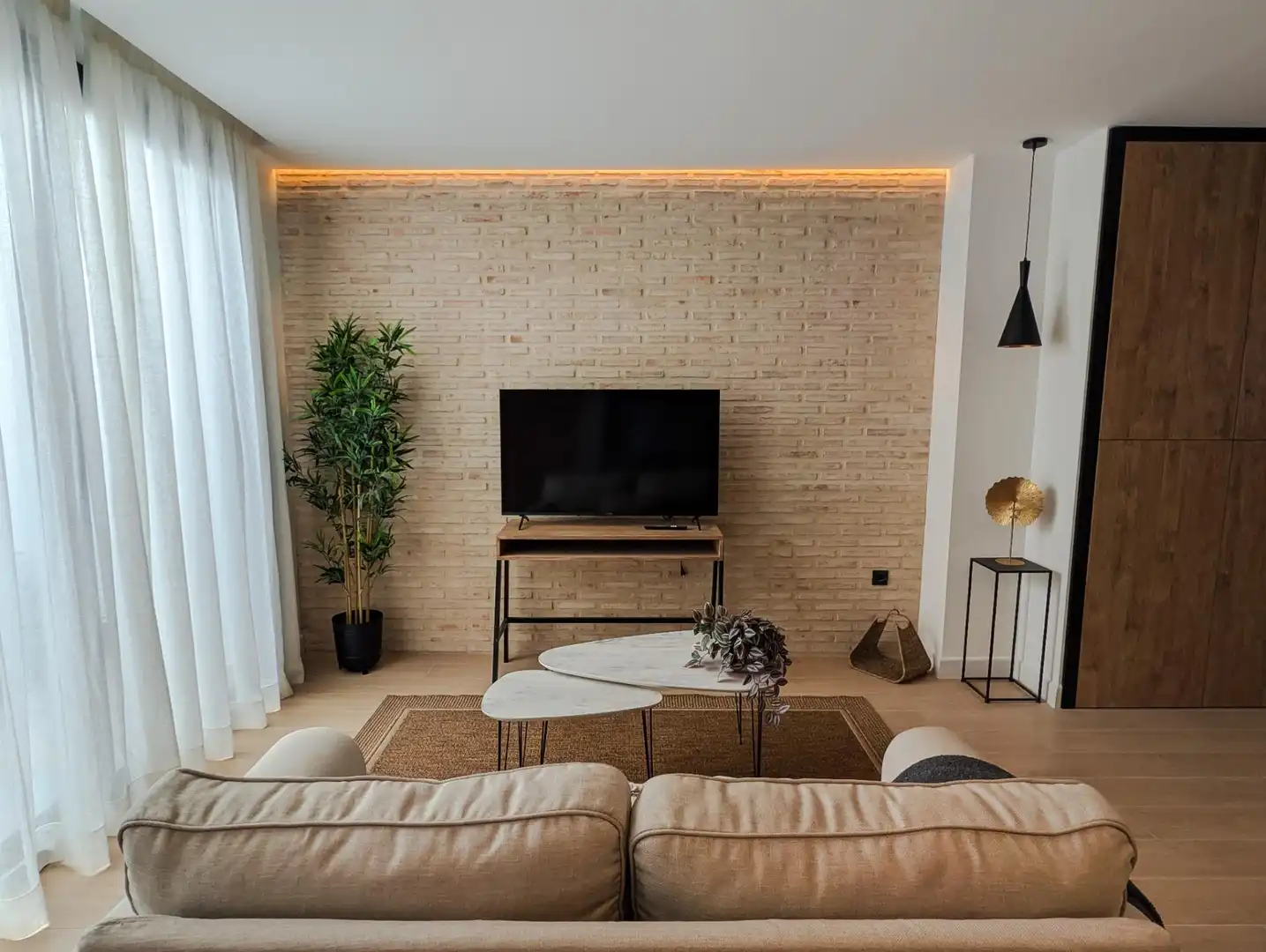 Living room of Flat for rent in Sanlúcar la Mayor  with Air Conditioner, Heating and Furnished