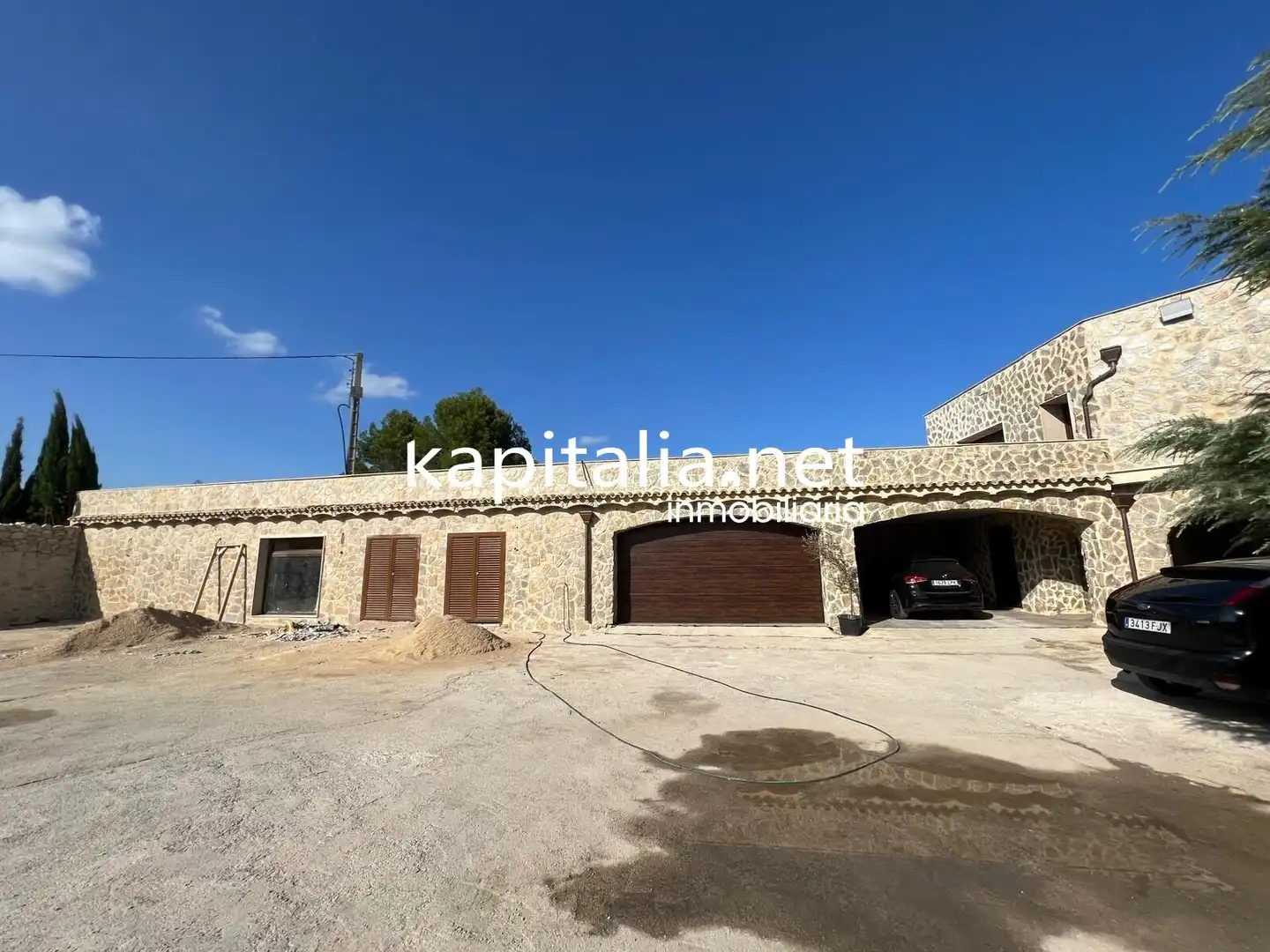 Vista exterior de Casa o xalet en venda en L'Olleria amb Calefacció, Jardí privat i Terrassa