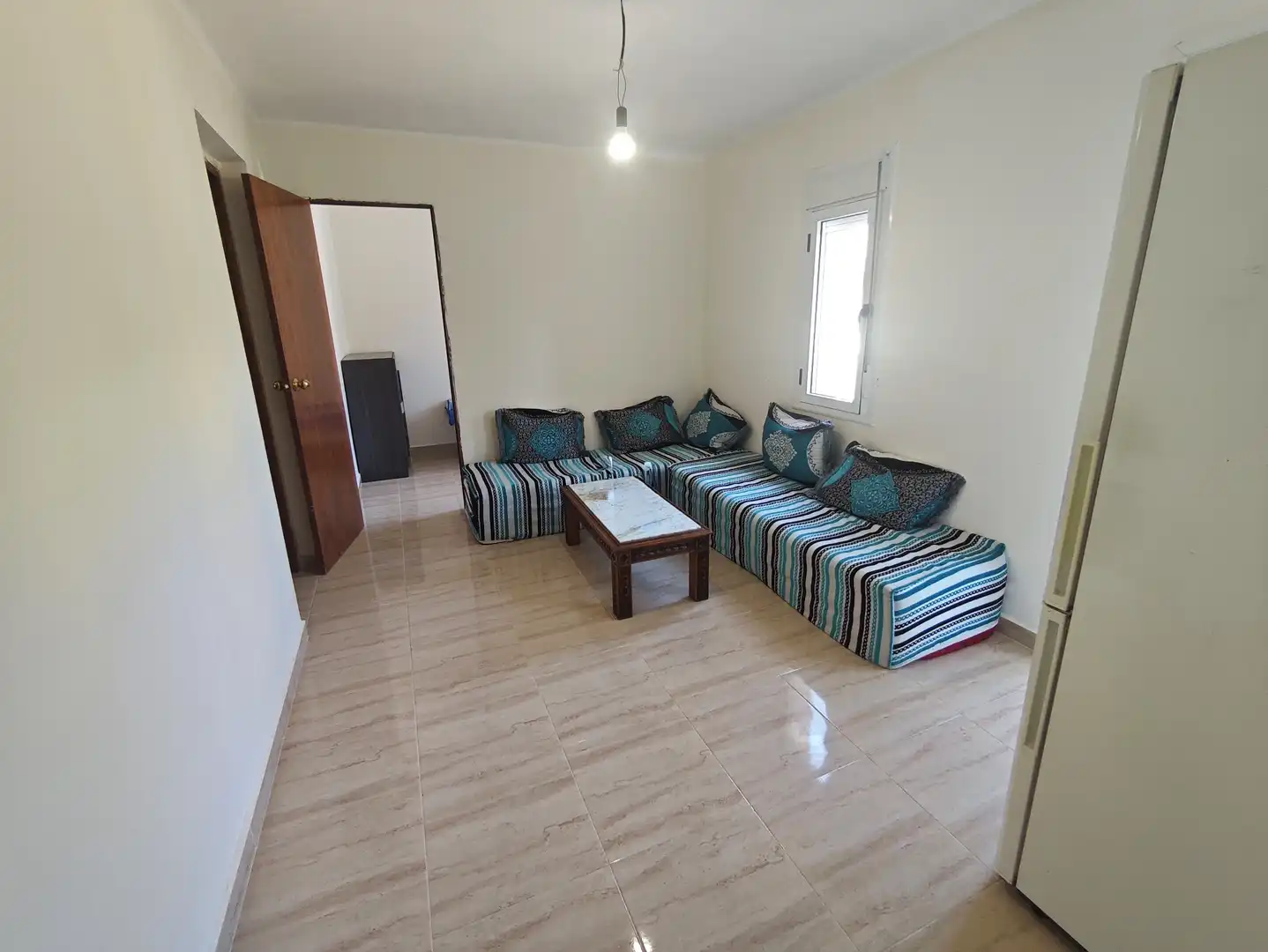 Sala d'estar de Pis en venda en L'Aldea amb Balcó