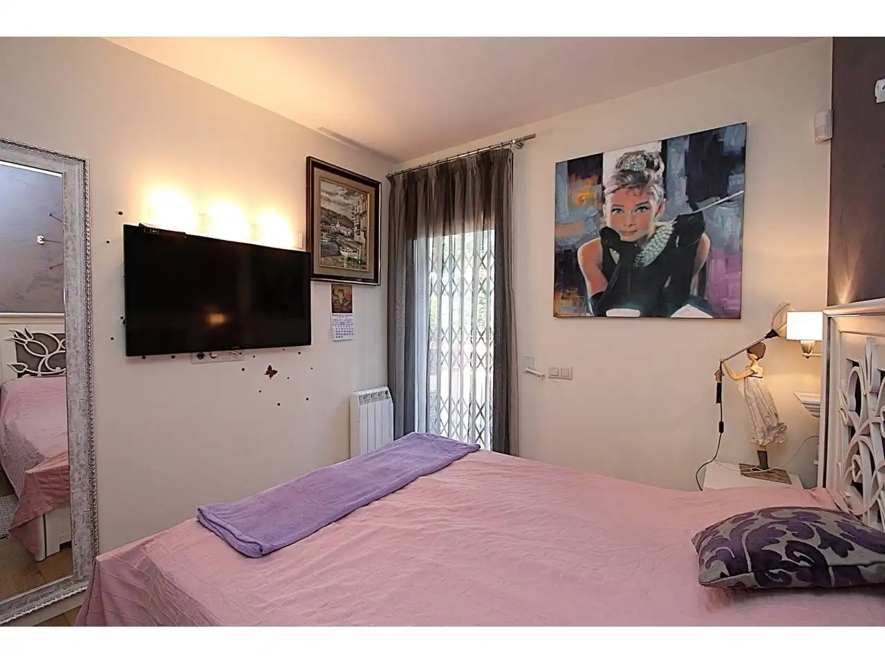 Schlafzimmer von Wohnung zum Verkauf in Lloret de Mar mit Klimaanlage, Heizung und Privatgarten