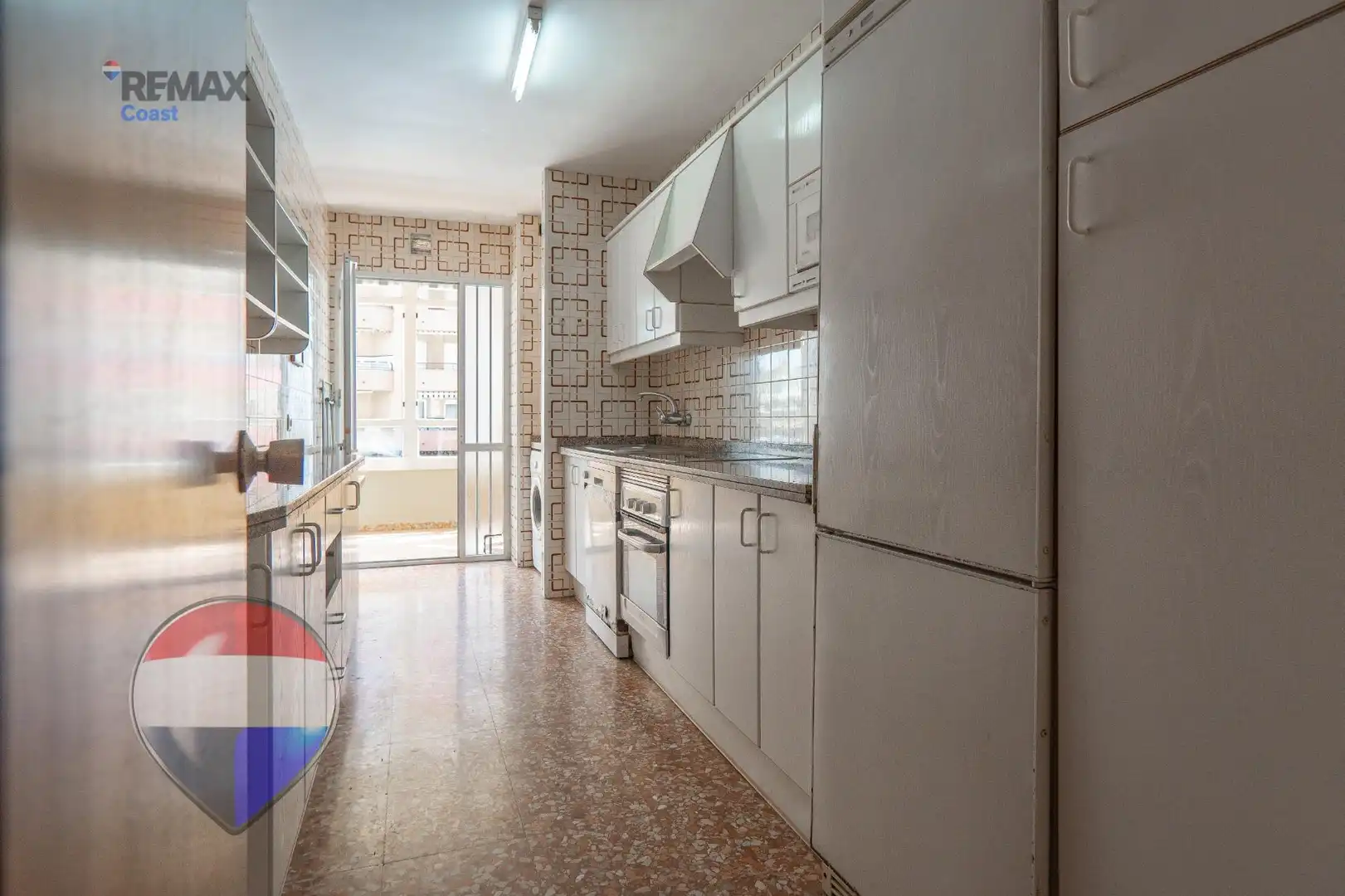 Küche von Wohnung zum Verkauf in Rincón de la Victoria mit Privatgarten, Terrasse und Gemeinschaftspool