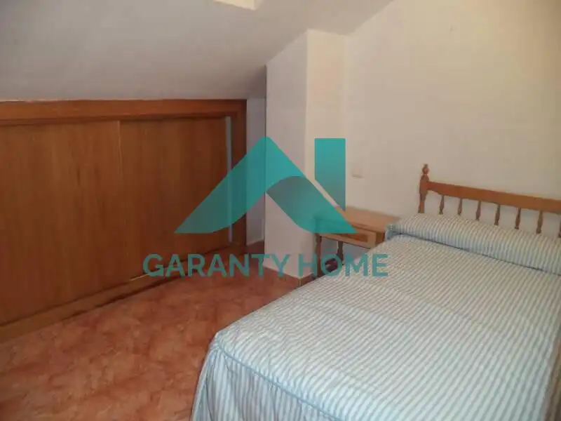 Dormitori de Apartament de lloguer en Cáceres amb Aire condicionat i Moblat