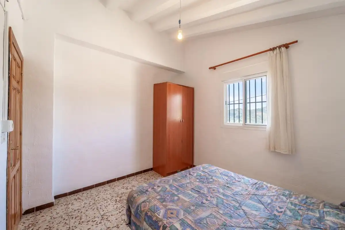 Habitación de Casa adosada en venta en Frigiliana con Aire acondicionado, Calefacción y Jardín privado