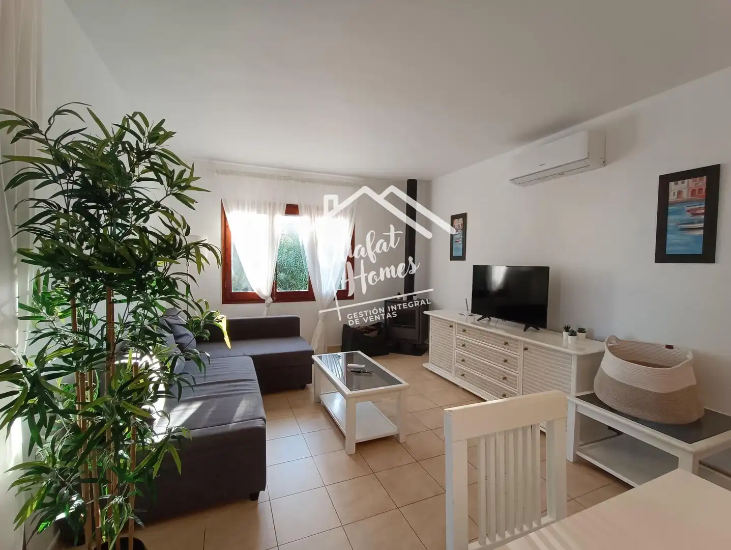 Sala de estar de Casa o chalet en venta en L'Ametlla de Mar  con Aire acondicionado, Calefacción y Jardín privado