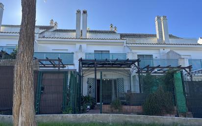 Vista exterior de Casa adosada en venda en El Portil amb Aire condicionat, Calefacció i Traster