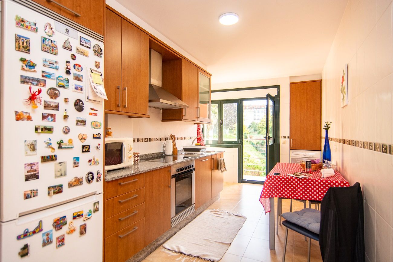 Kitchen of Flat for sale in Carral  with Heating, Parquet flooring and Storage room