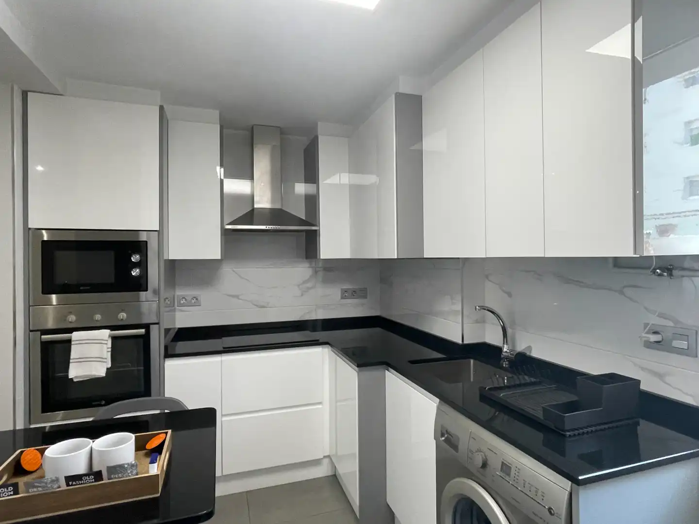 Kitchen of Flat for rent in Gijón   with Heating, Terrace and Furnished