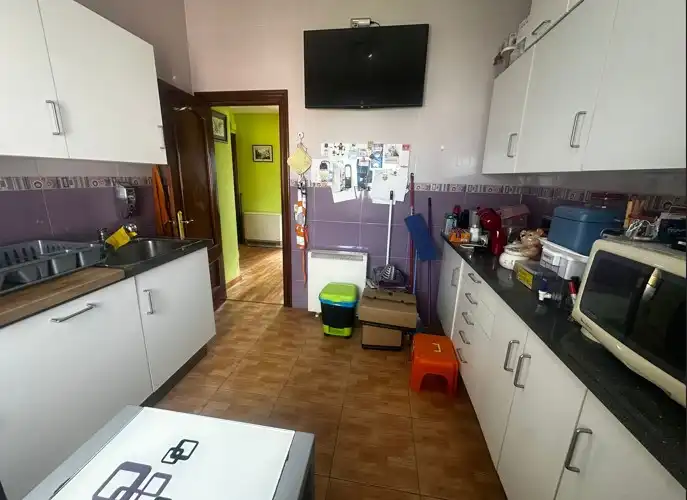 Kitchen of Flat for sale in Gijón   with Heating, Private garden and Furnished