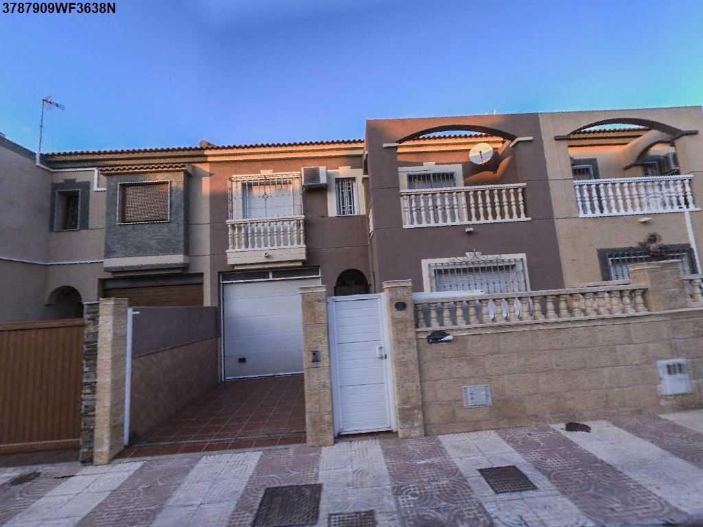 Exterior view of Single-family semi-detached for sale in Roquetas de Mar