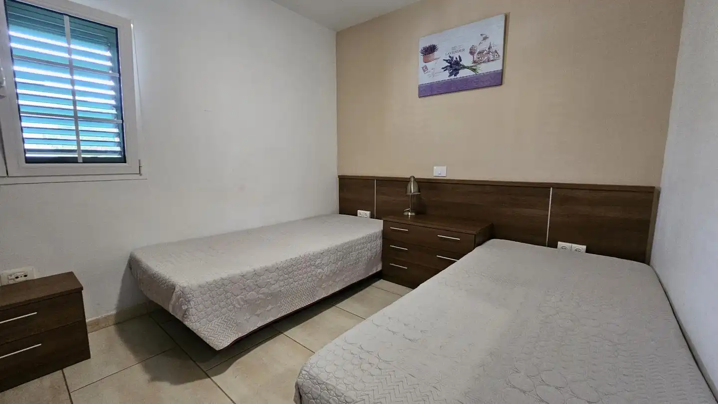 Bedroom of Flat for sale in San Bartolomé de Tirajana  with Air Conditioner, Furnished and Community pool