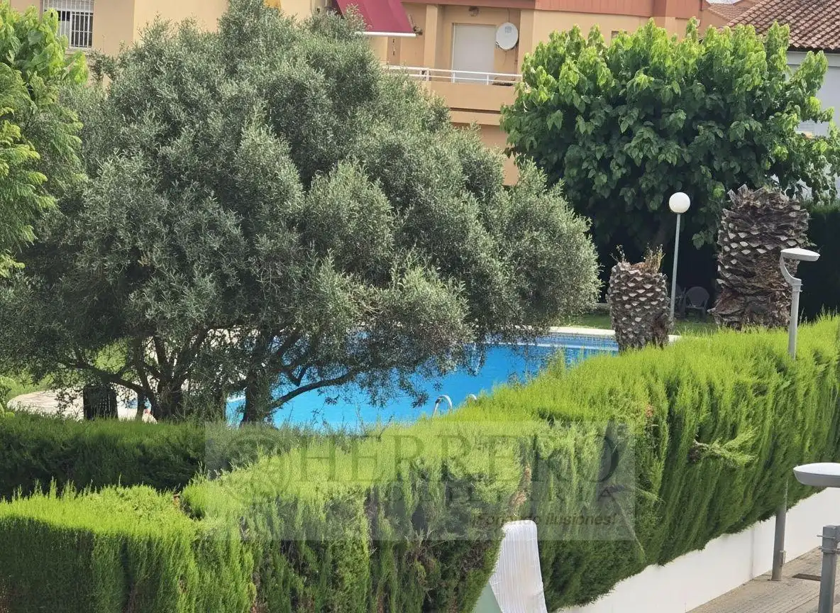 Piscina de Casa adosada en venta en Gandia con Aire acondicionado, Calefacción y Jardín privado