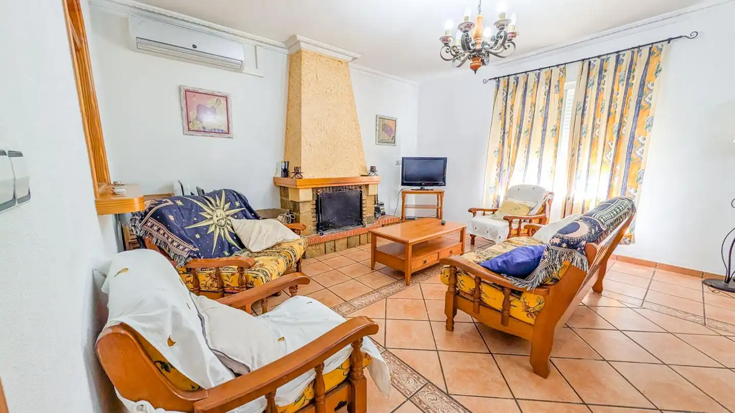 Sala d'estar de Casa o xalet en venda en Elche / Elx amb Aire condicionat, Jardí privat i Terrassa