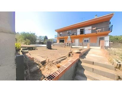 Exterior view of House or chalet for sale in Pontons  with Oven and Balcony