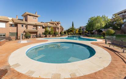 Swimming pool of Flat for sale in La Zubia  with Air Conditioner, Heating and Private garden