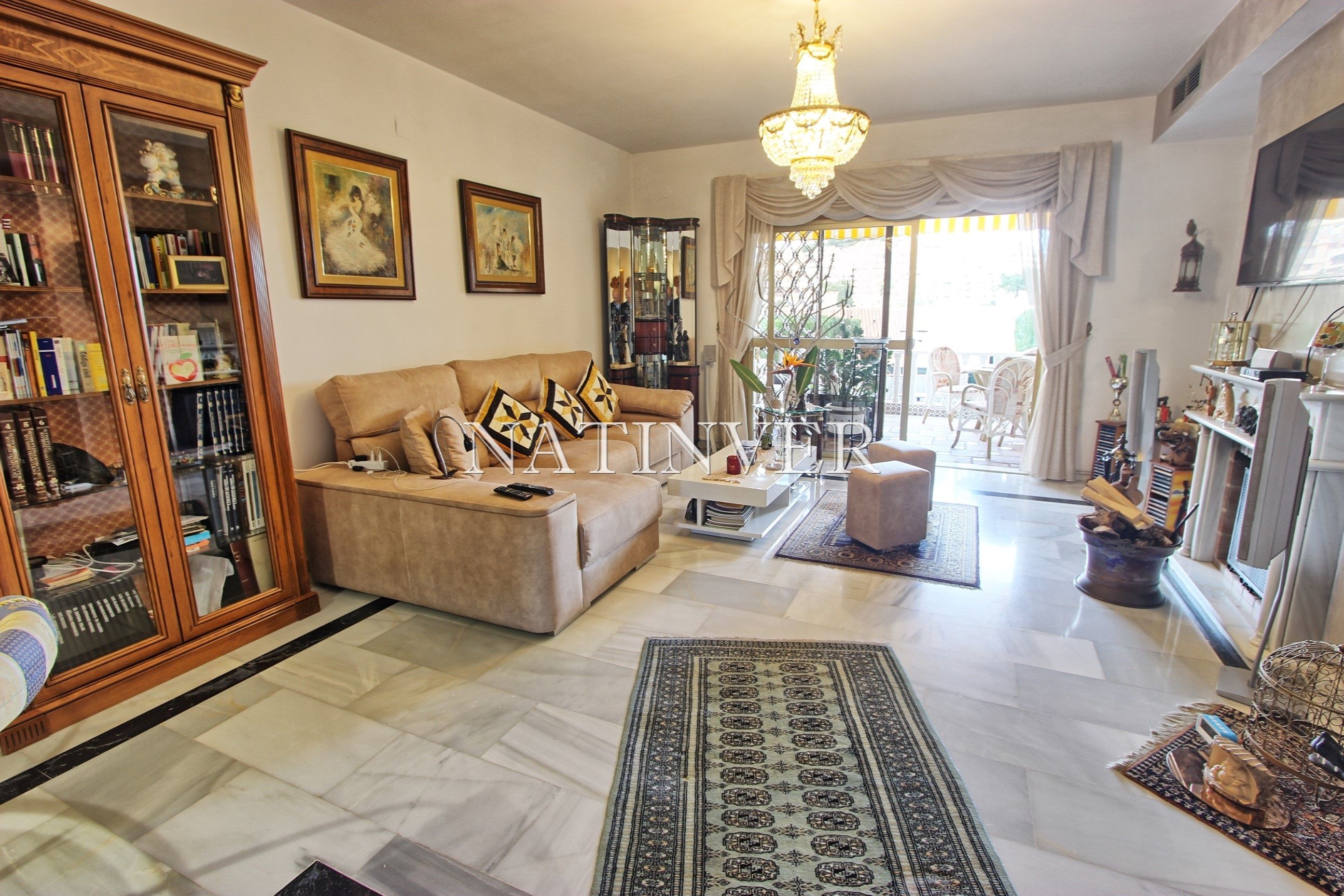 Sala de estar de Casa adosada en venta en Benalmádena con Aire acondicionado, Calefacción y Jardín privado