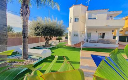 Vista exterior de Casa o xalet en venda en San Antonio de Benagéber amb Aire condicionat, Calefacció i Jardí privat