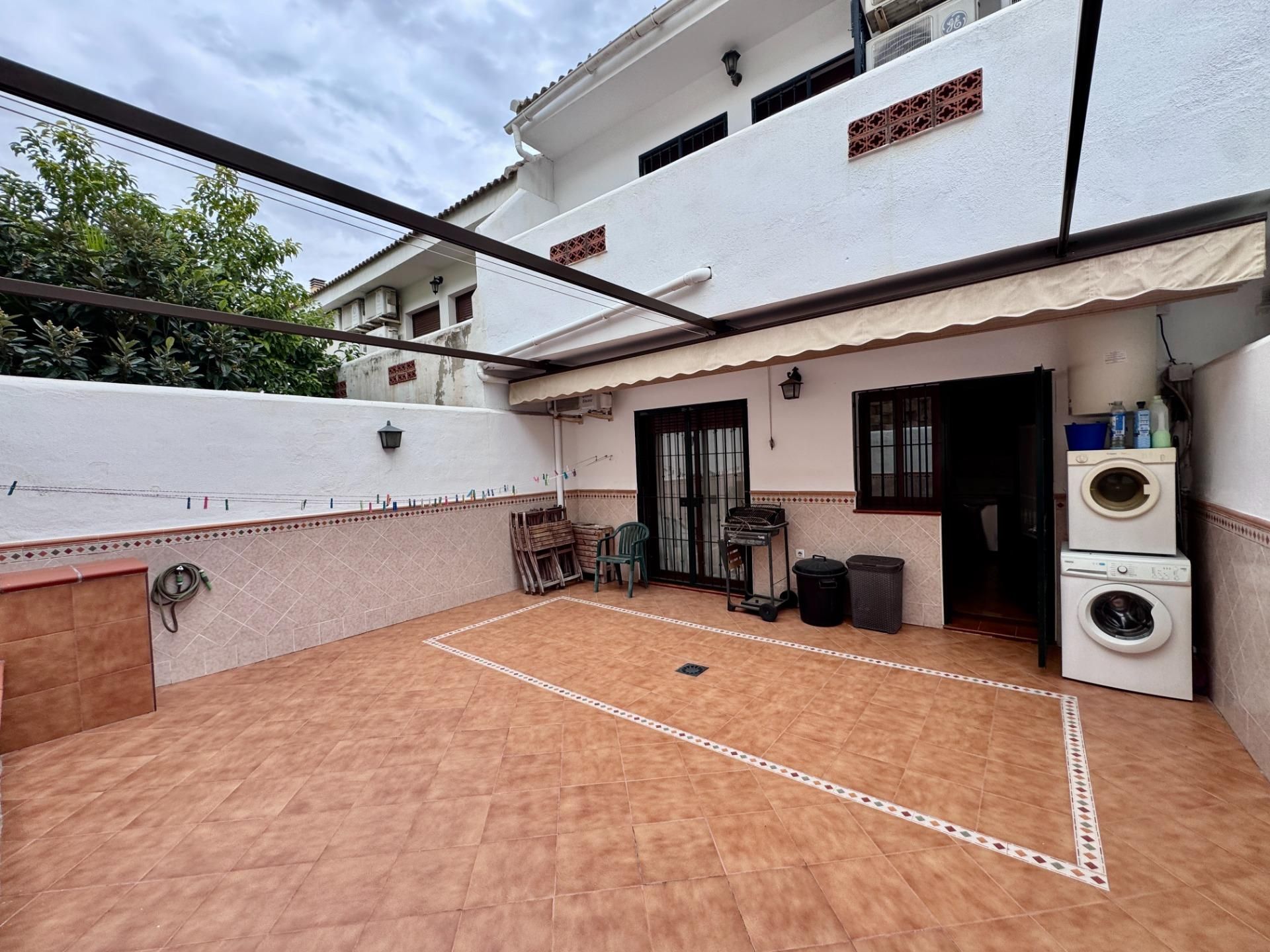 Exterior view of Single-family semi-detached for sale in Benalmádena  with Air Conditioner, Terrace and Storage room
