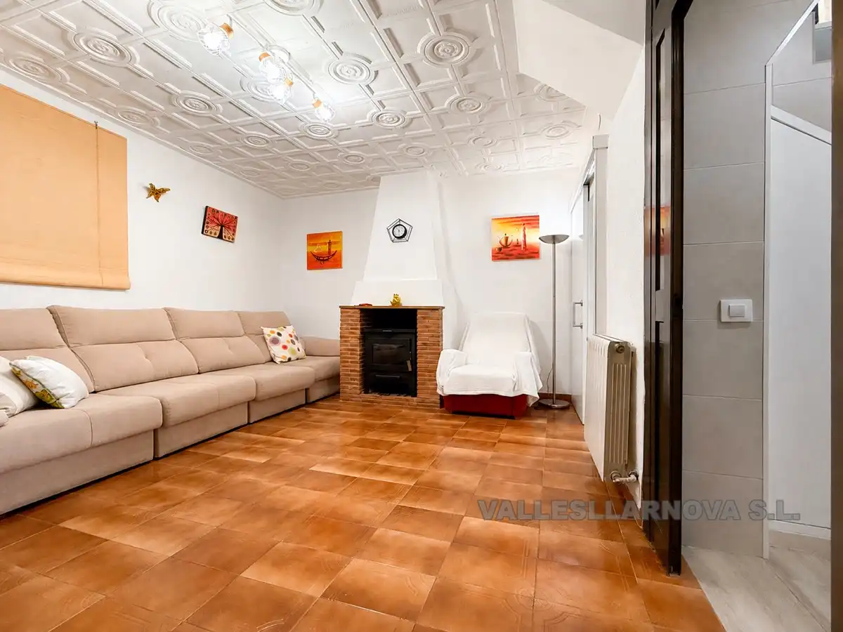 Sala d'estar de Casa adosada en venda en Mollet del Vallès amb Aire condicionat, Calefacció i Jardí privat