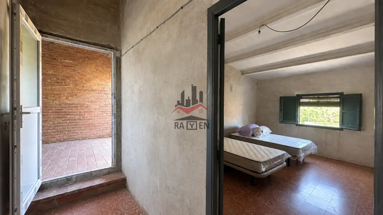 Dormitori de Casa adosada en venda en Riumors