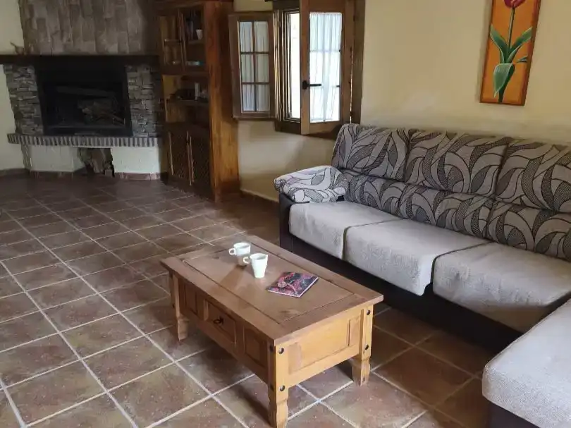 Sala d'estar de Casa o xalet en venda en Huéscar amb Jardí privat, Piscina i Moblat