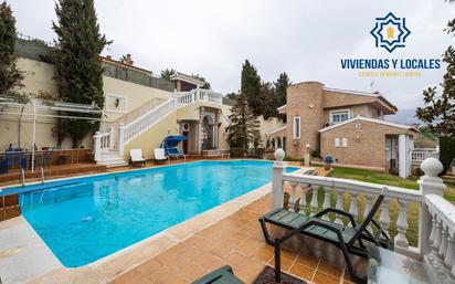 Swimming pool of House or chalet for sale in  Granada Capital  with Air Conditioner, Heating and Private garden