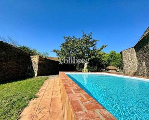 Swimming pool of Country house to rent in Población de Arroyo  with Air Conditioner, Heating and Private garden