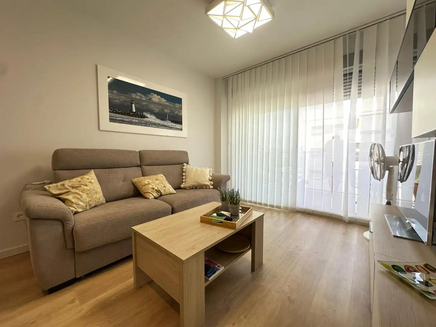 Sala d'estar de Apartament de lloguer en Daimús amb Moblat, Balcó i Piscina comunitària