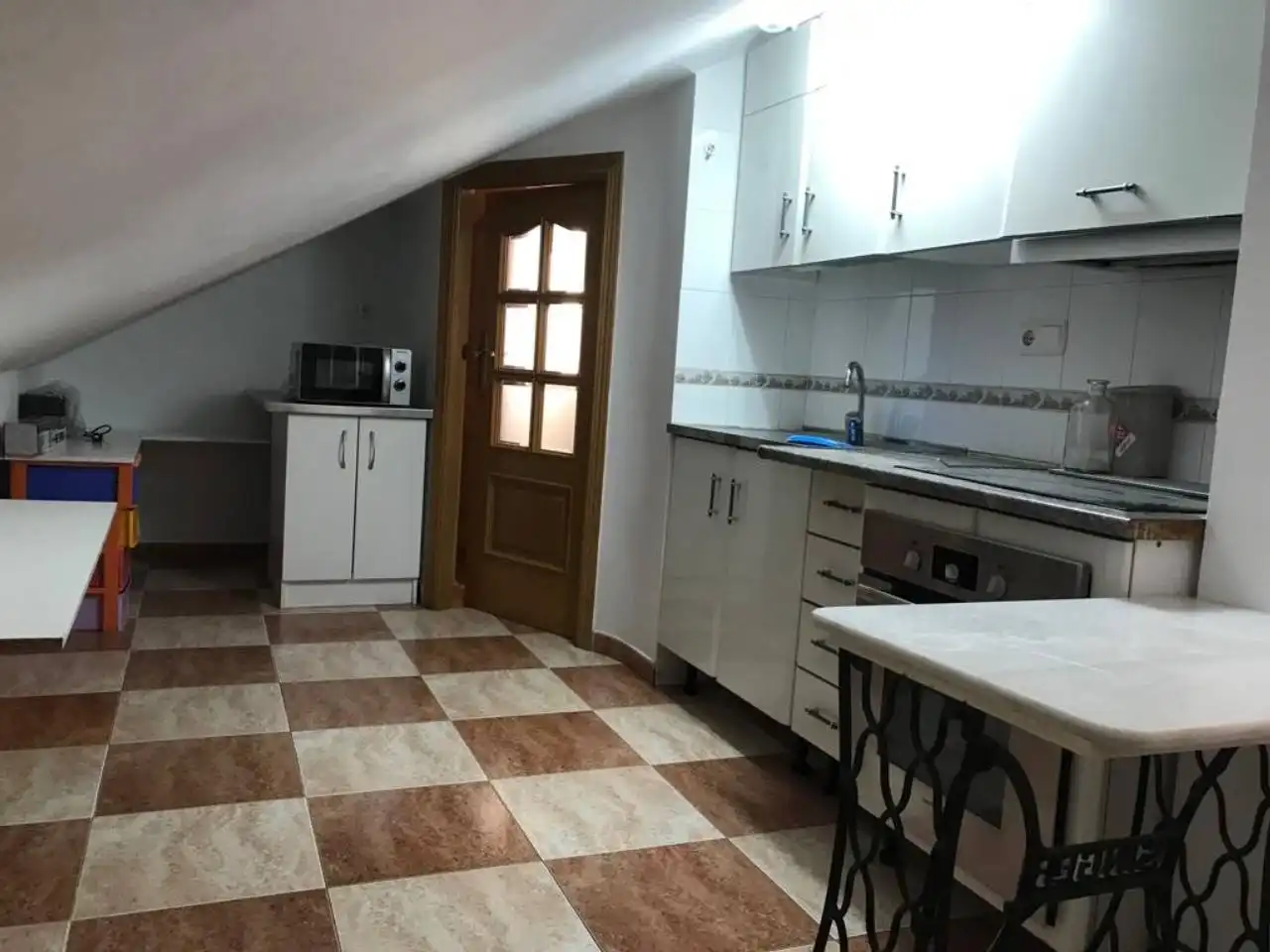 Cocina de Ático de alquiler en Baza con Aire acondicionado, Terraza y Amueblado