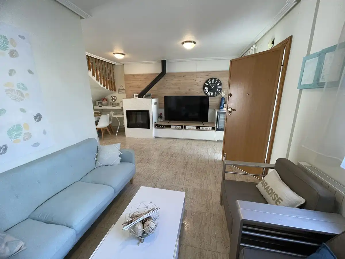 Sala d'estar de Casa o xalet en venda en Pilar de la Horadada amb Aire condicionat, Jardí privat i Terrassa